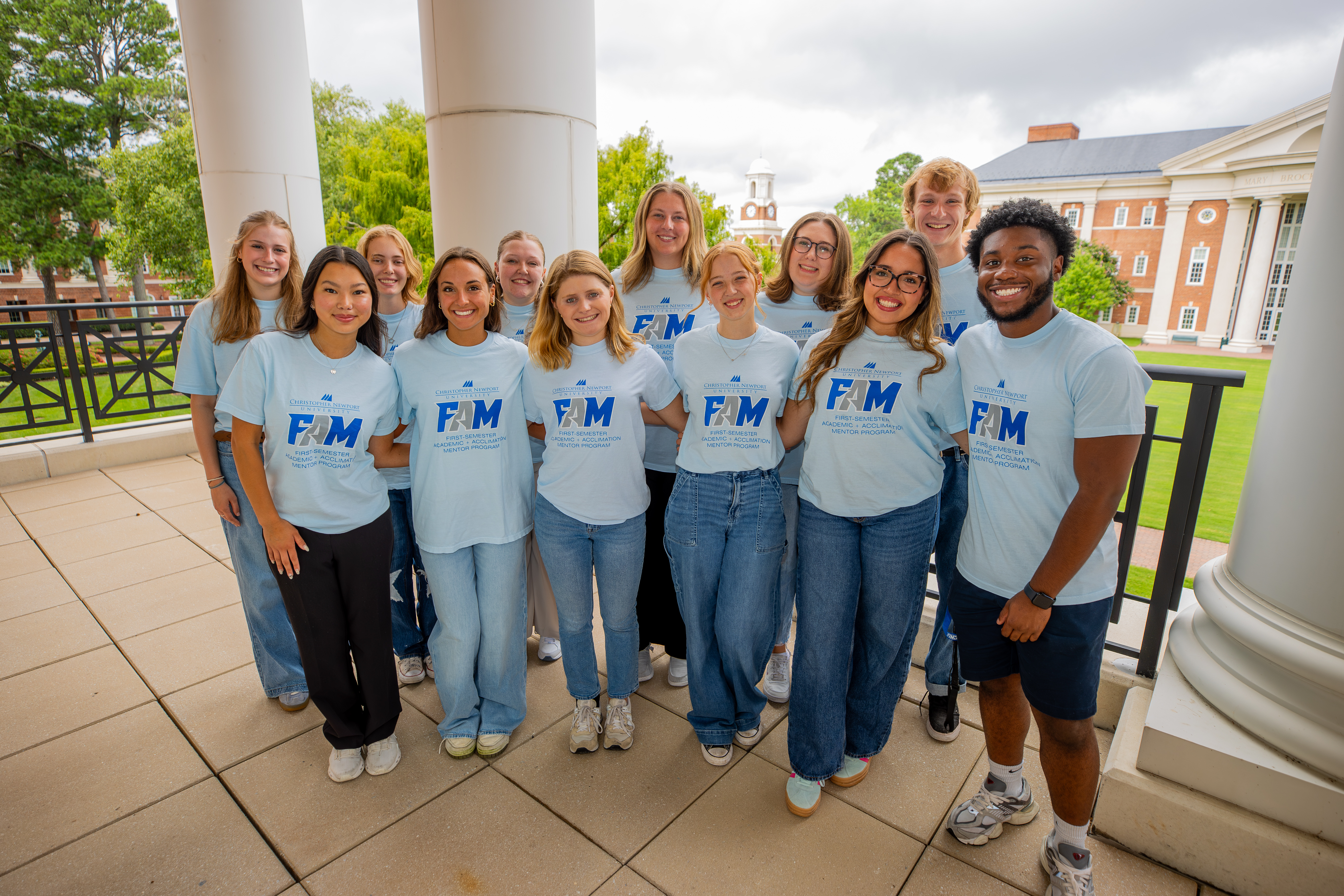 Students wearing their First Semester Academic & Acclimation Mentors shirts.